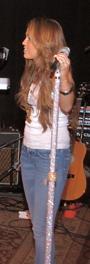Miley Cyrus — Elton John takes the piano; Miley takes a verse