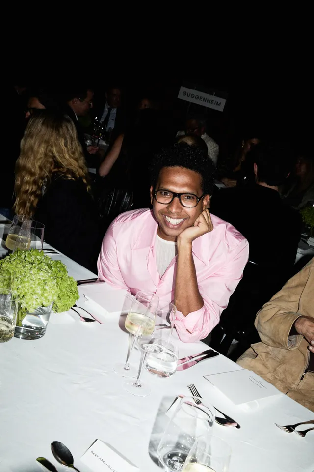 Image may contain Accessories Glasses Dining Table Furniture Table Face Head Person Photography and Portrait