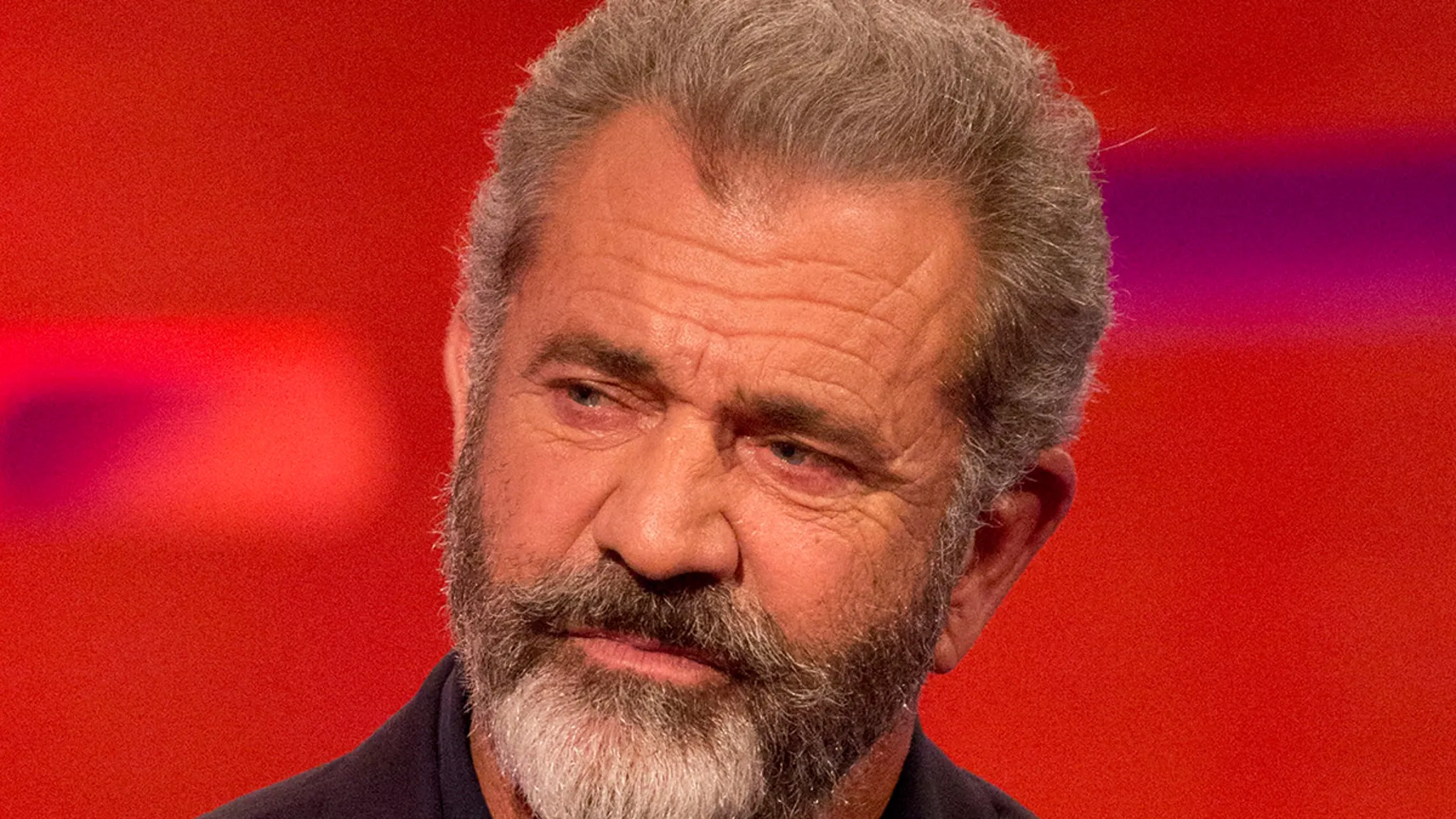 Mel Gibson speaking at a fan event