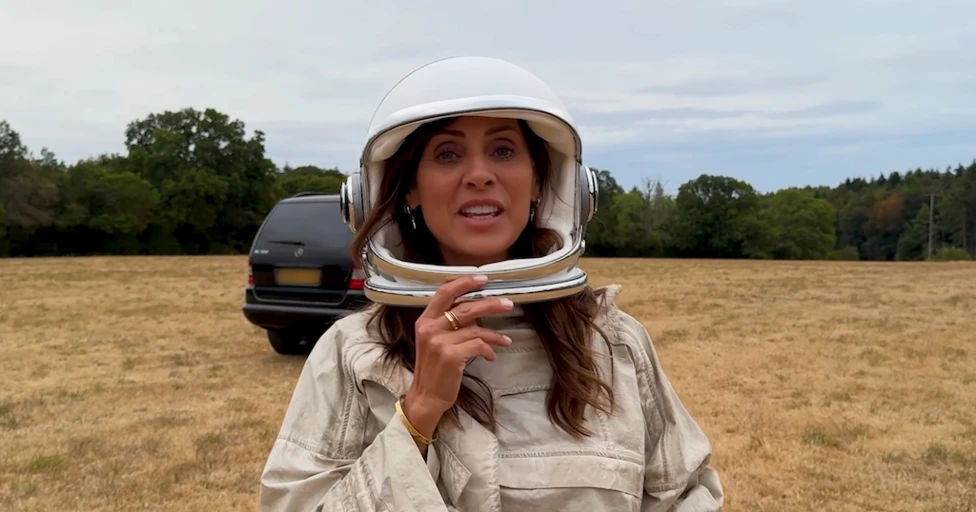 Natalie Imbruglia wears an astronaut's helmet in the video for her single Beautiful Love