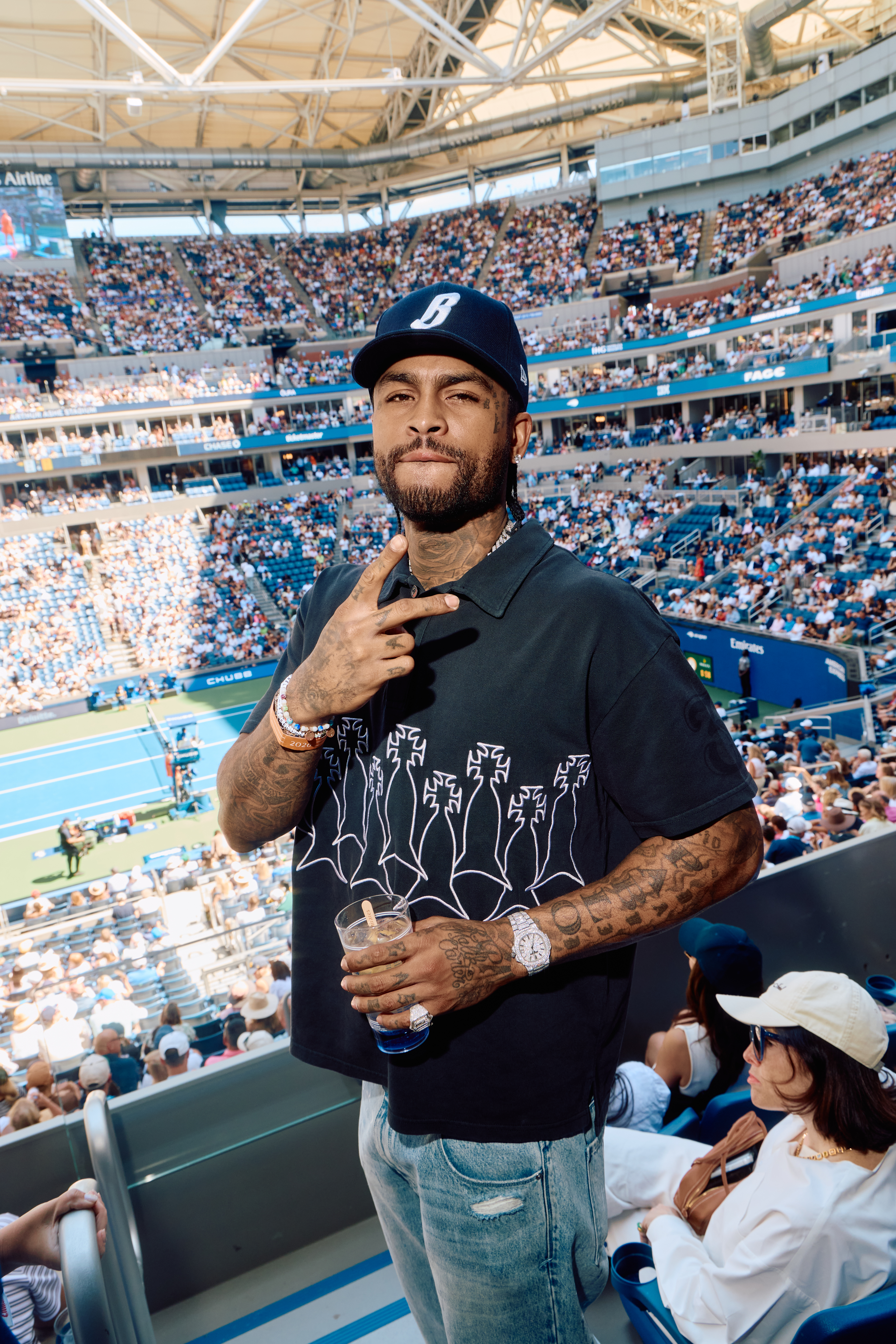 Hip-hop artist Dave East attending an event.