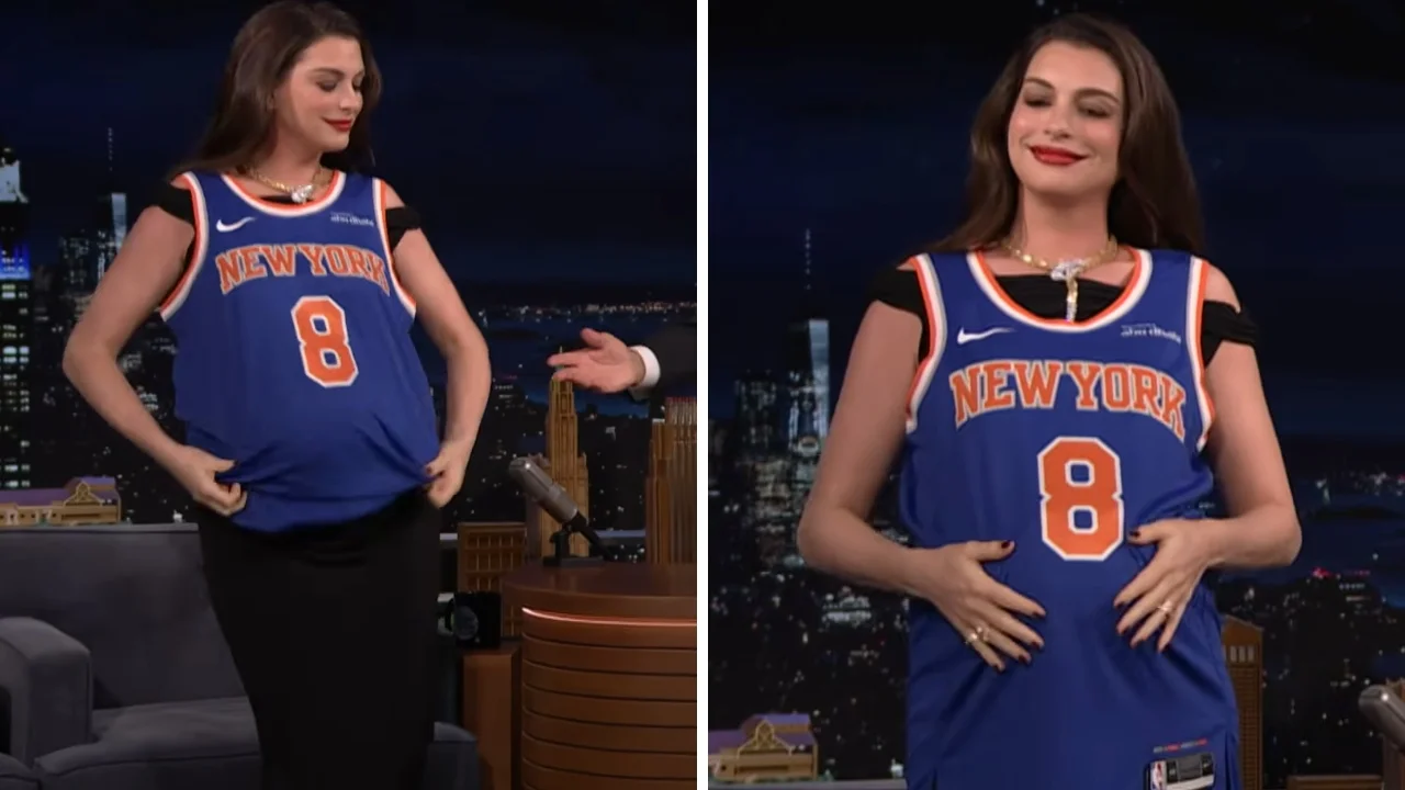 Anne Hathaway models her new Knicks jersey for the Late Night With Jimmy Fallon audience