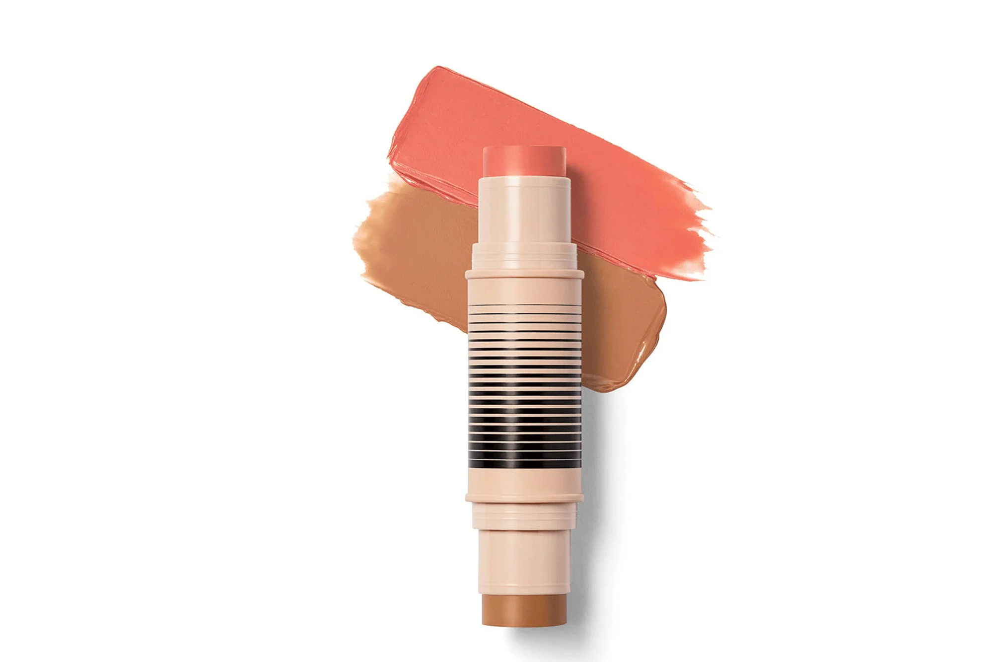 Dibs Beauty stick with peach and tan swatches.