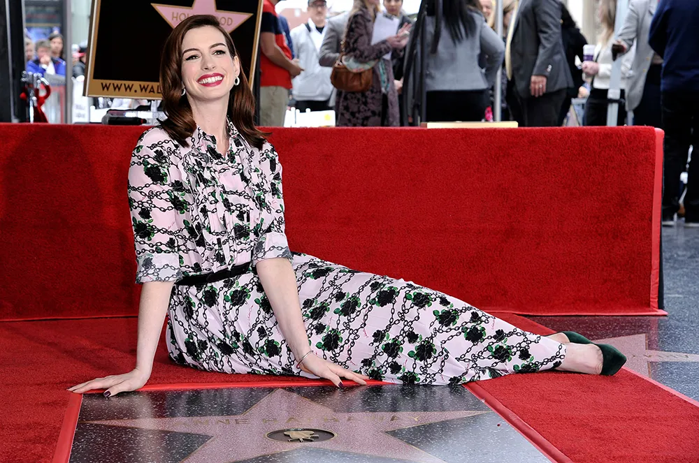 Anne Hathaway poses atop her new star on the Hollywood Walk of Fame following a ceremony in her honor, in Los Angeles Anne Hathaway Honored with a Star on the Hollywood Walk of Fame, Los Angeles, USA - 09 May 2019