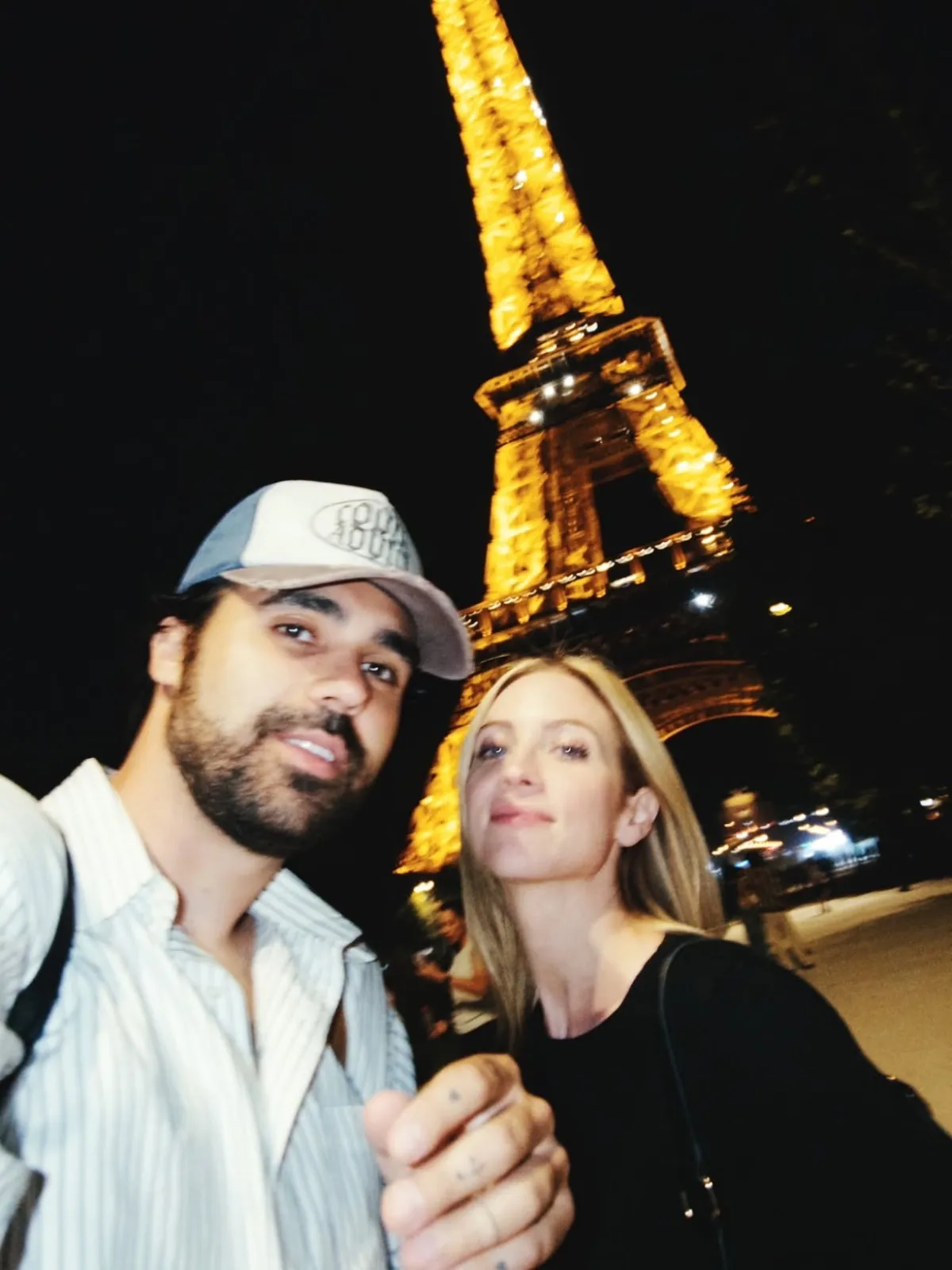 Brittany Snow and fiancé Hunter Moreno posing together during romantic Paris trip