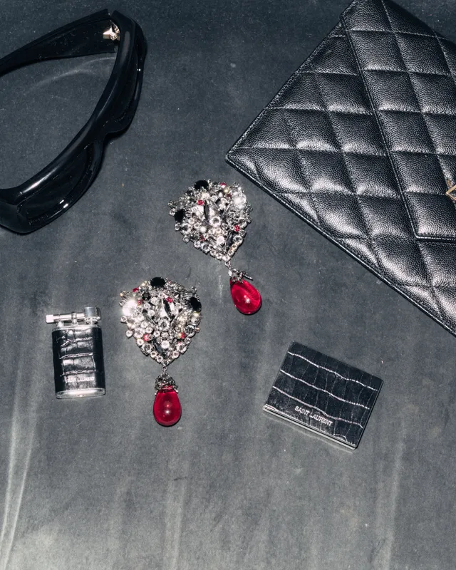 Image may contain Accessories Symbol and Wallet