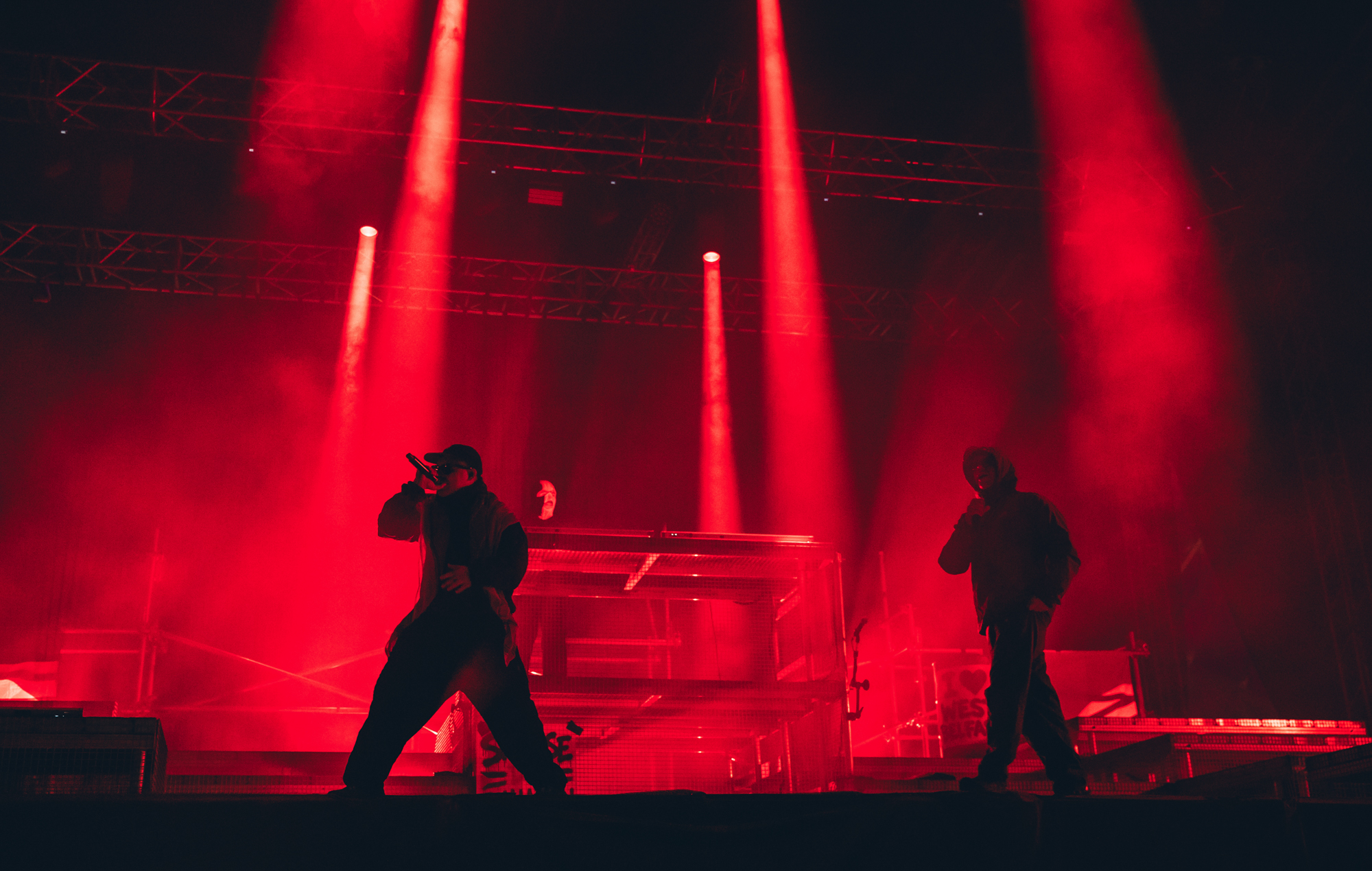 Kneecap performing live on stage during a concert