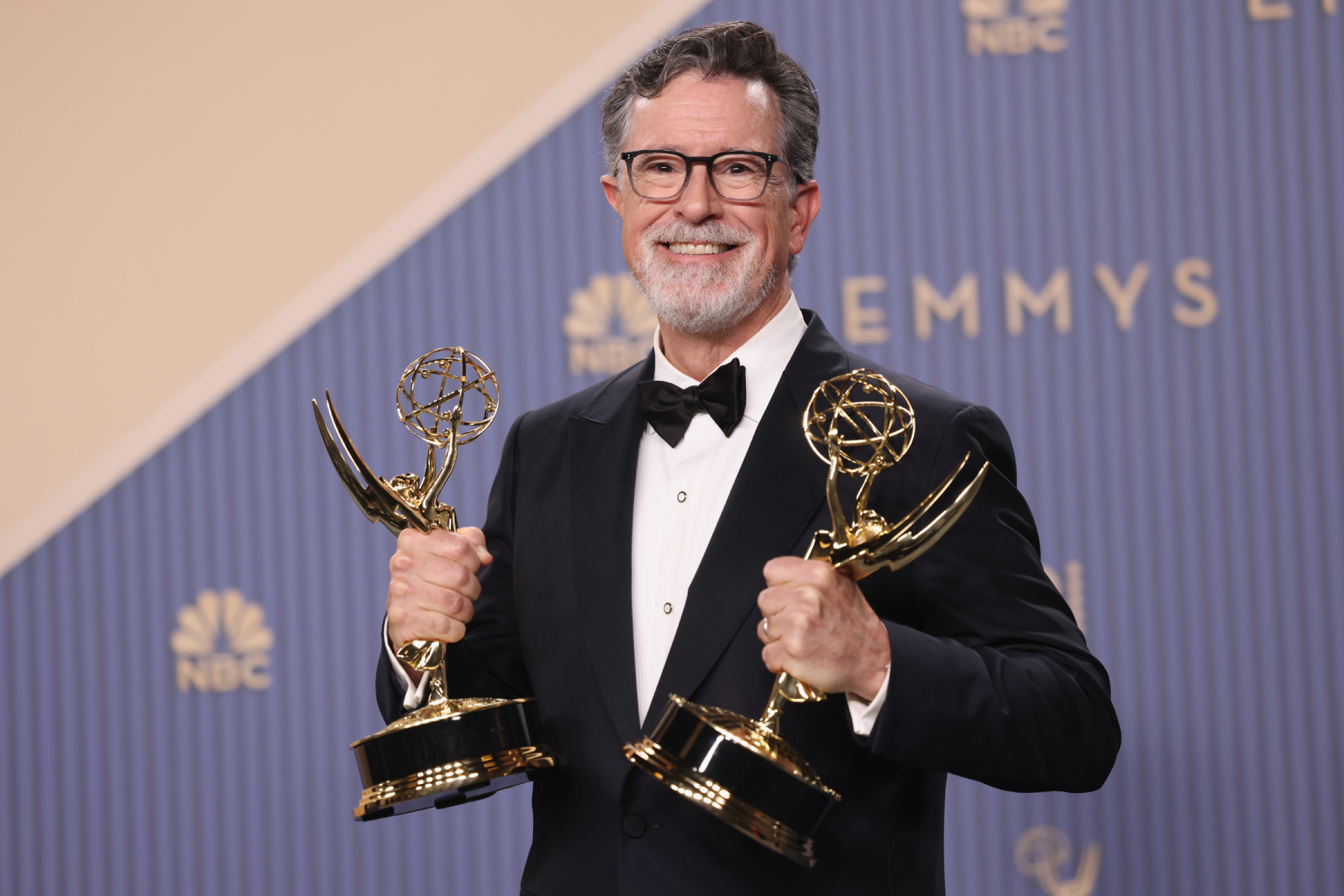 Stephen Colbert speaking to press at the Emmy Awards red carpet