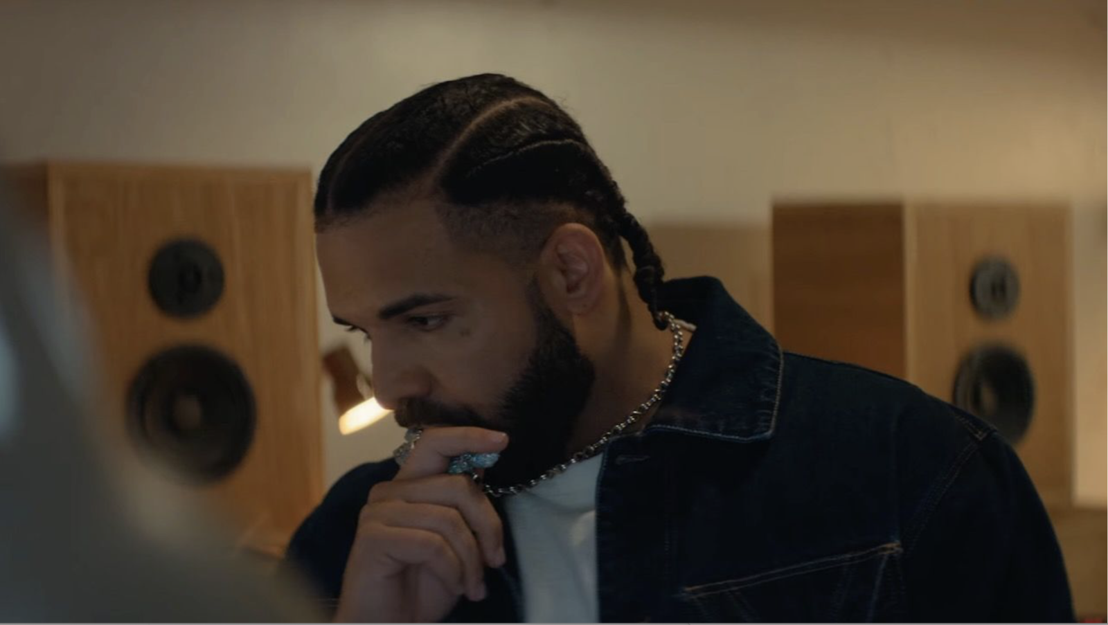 Drake posing in a promotional style for a new project