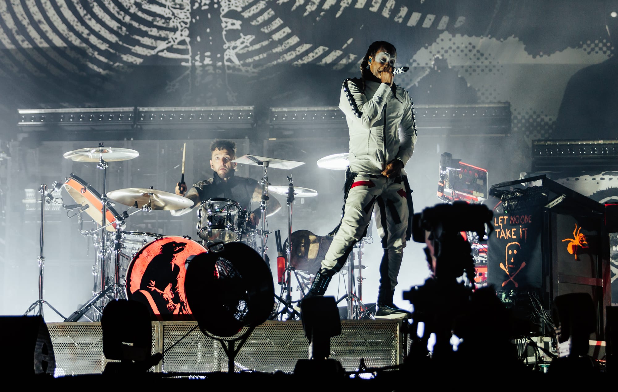 The Prodigy performing live on stage at a electronic music festival