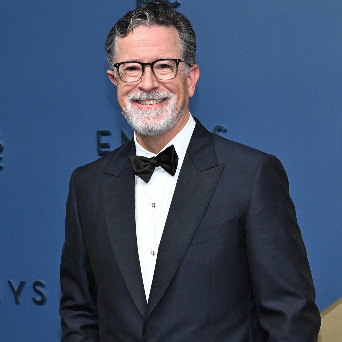 Stephen Colbert debuting a scruffy new beard on the red carpet at the 2026 Emmy Awards