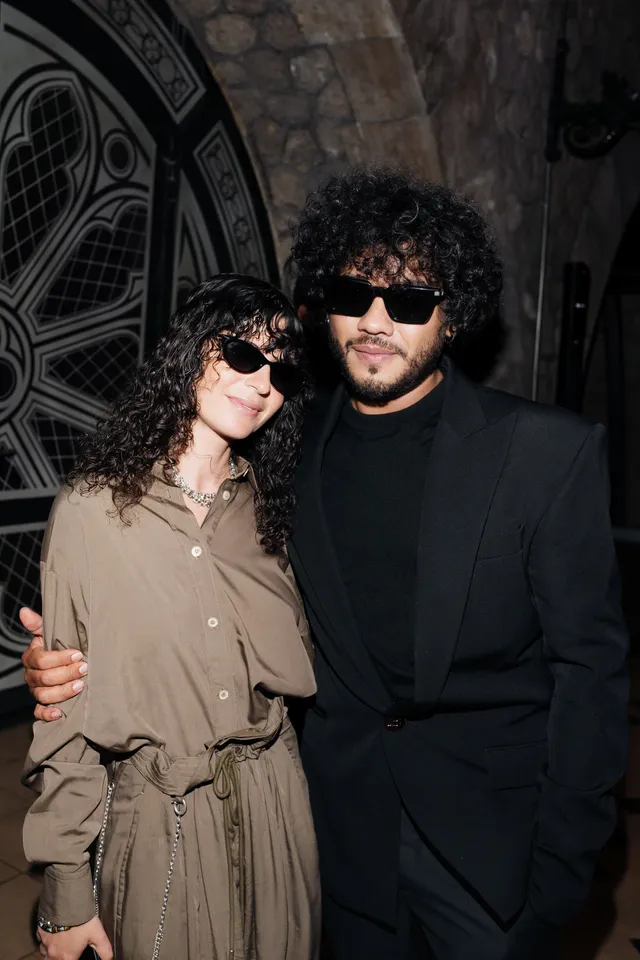Image may contain Richard Ayoade Ana Cristina Cesar Accessories Sunglasses Curly Hair Hair Person Adult and Jewelry
