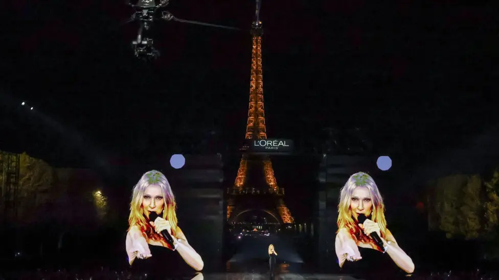 Celine Dion belted out her 2002 hit on the L'Oreal catwalk in front of the Eiffel Tower