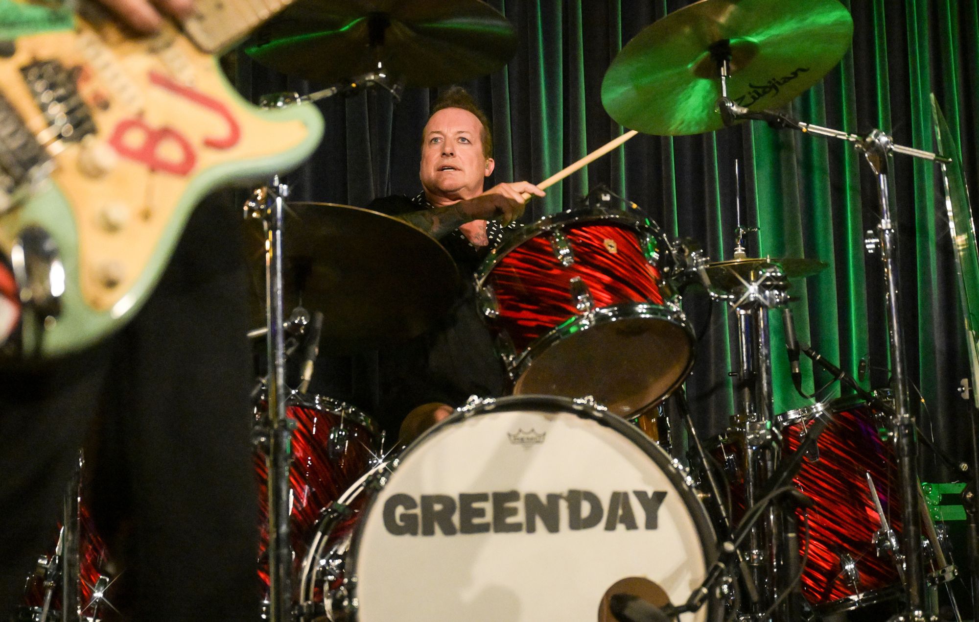 Green Day drummer Tré Cool performing live on stage