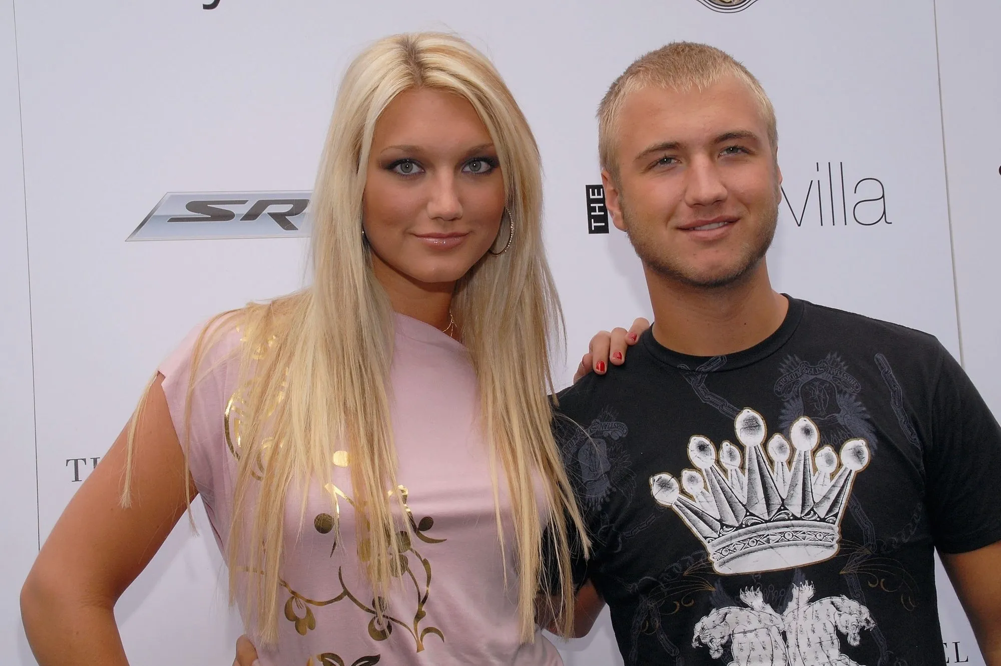 Nick Hogan and Brooke Hogan posing together at a public event
