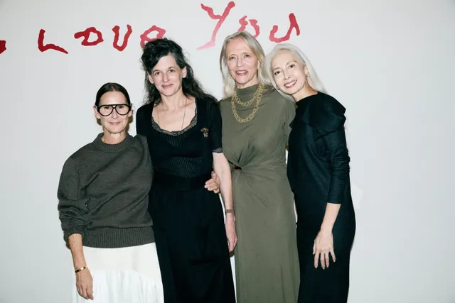 Image may contain Sophie Wilmès Adult Person Clothing Dress People Fashion Face Head Photobombing and Accessories