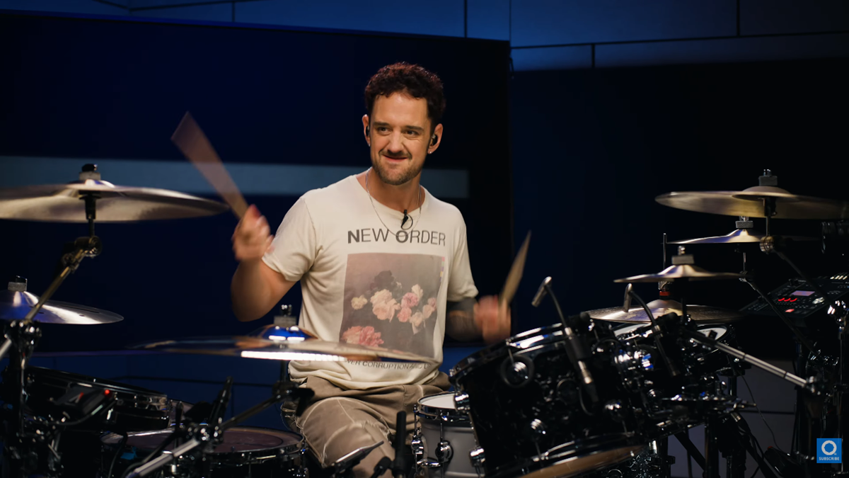 Colin Brittain playing drums during a musical studio session
