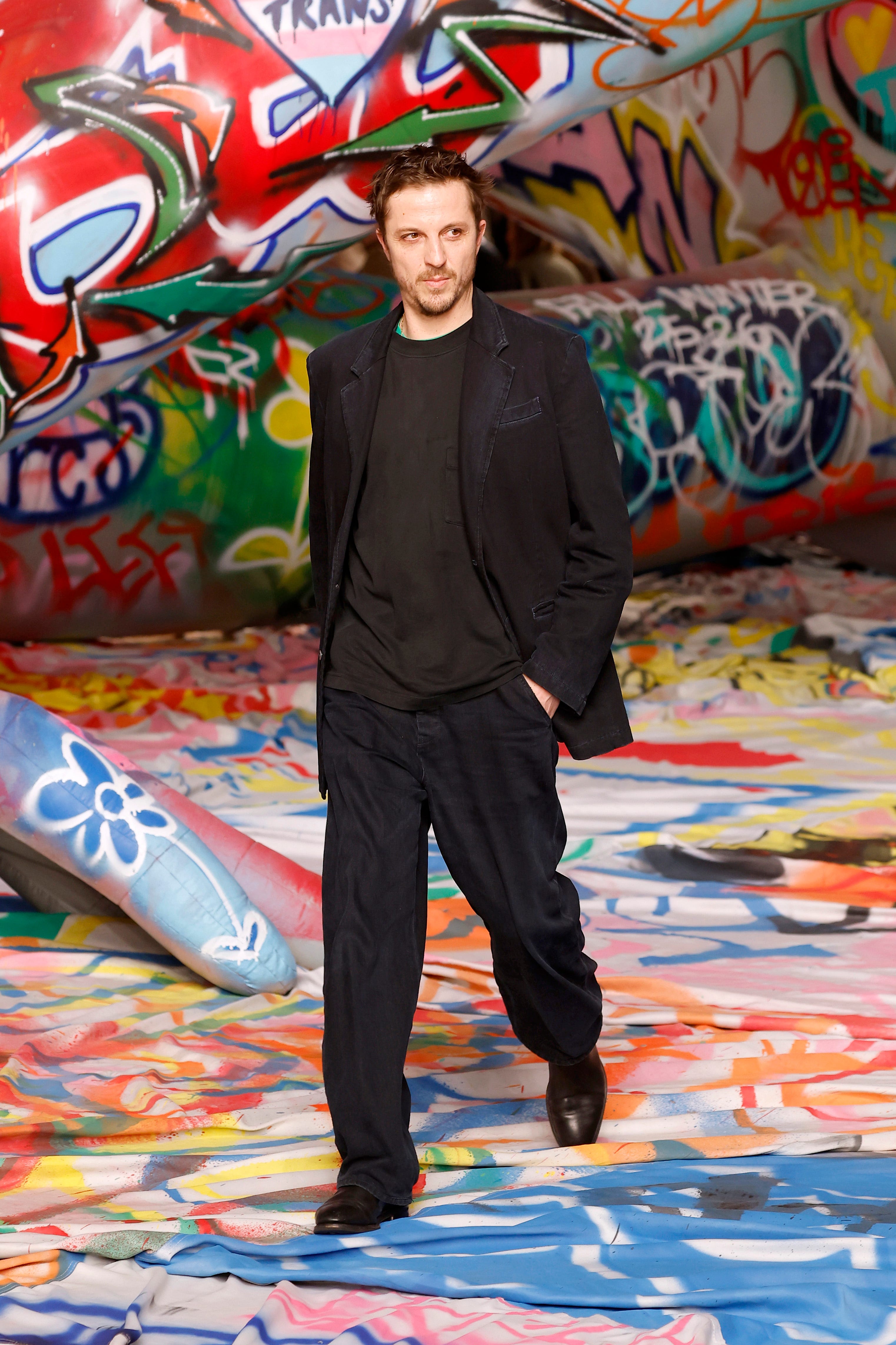 Glenn Martens attending a high-fashion runway event