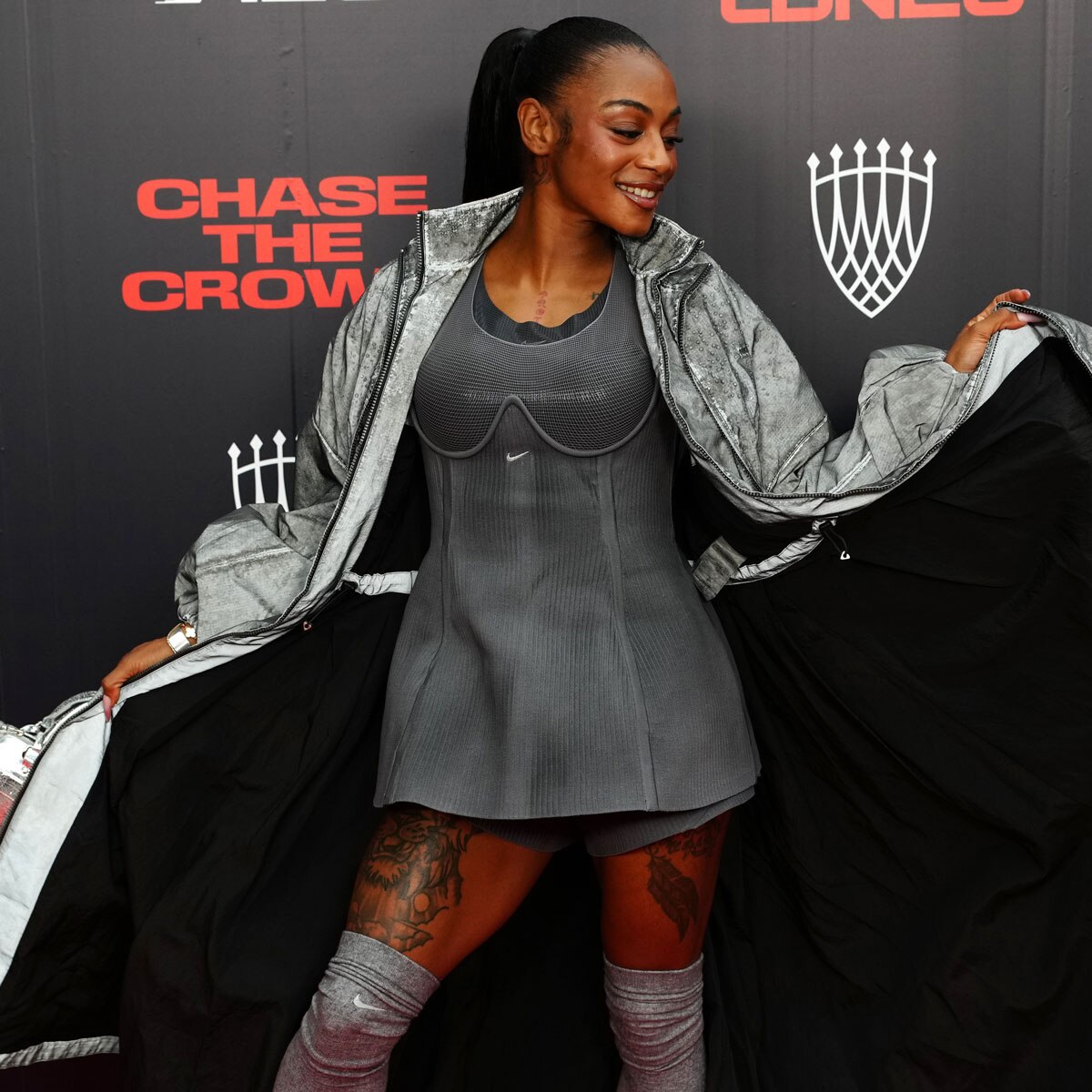 Sha'Carri Richardson wearing a custom Nike Atelier outfit on the red carpet in London