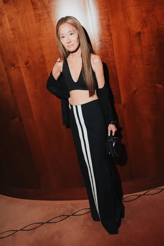 Image may contain Vera Wang Blonde Hair Person Face Head Photography Portrait Clothing Dress and Adult