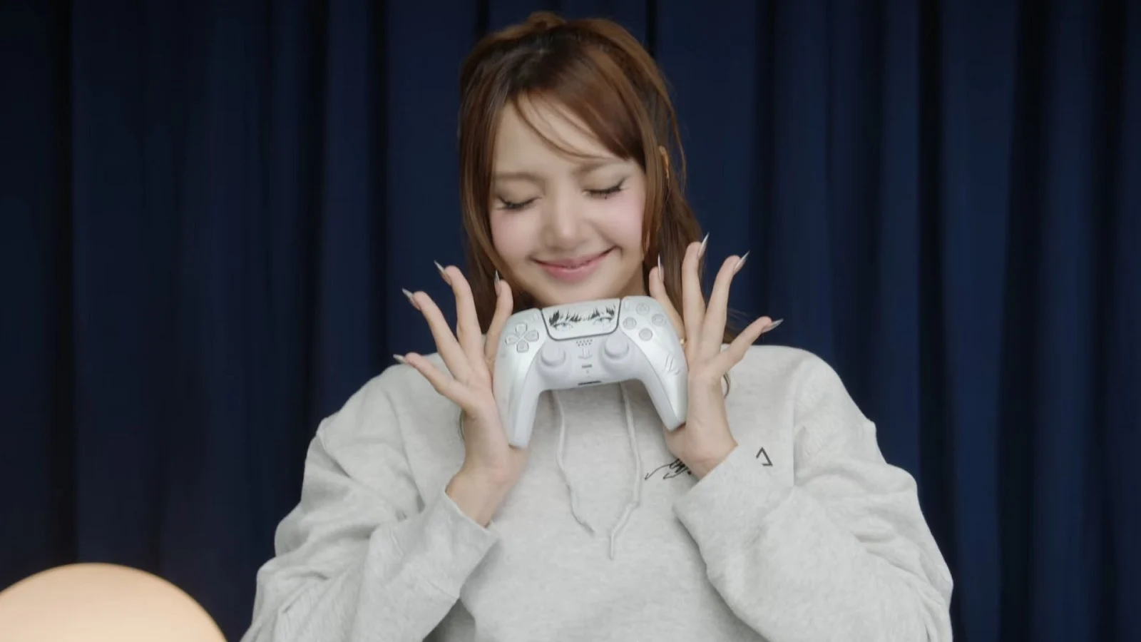 Lisa holding a controller