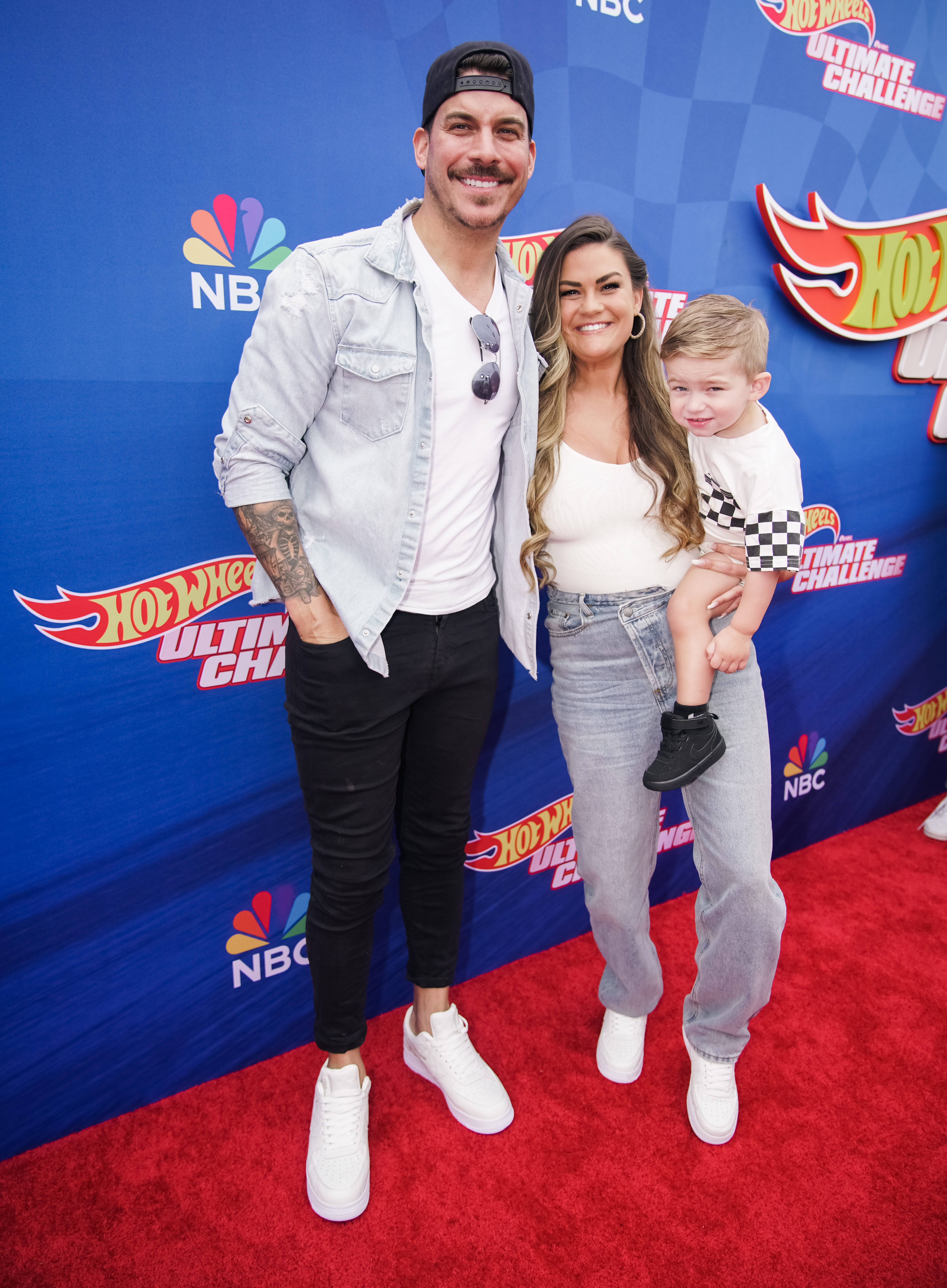 Jax Taylor and Brittany Cartwright step out with their young son, Cruz, whom the former couple continues to co-parent amid their drawn-out divorce.