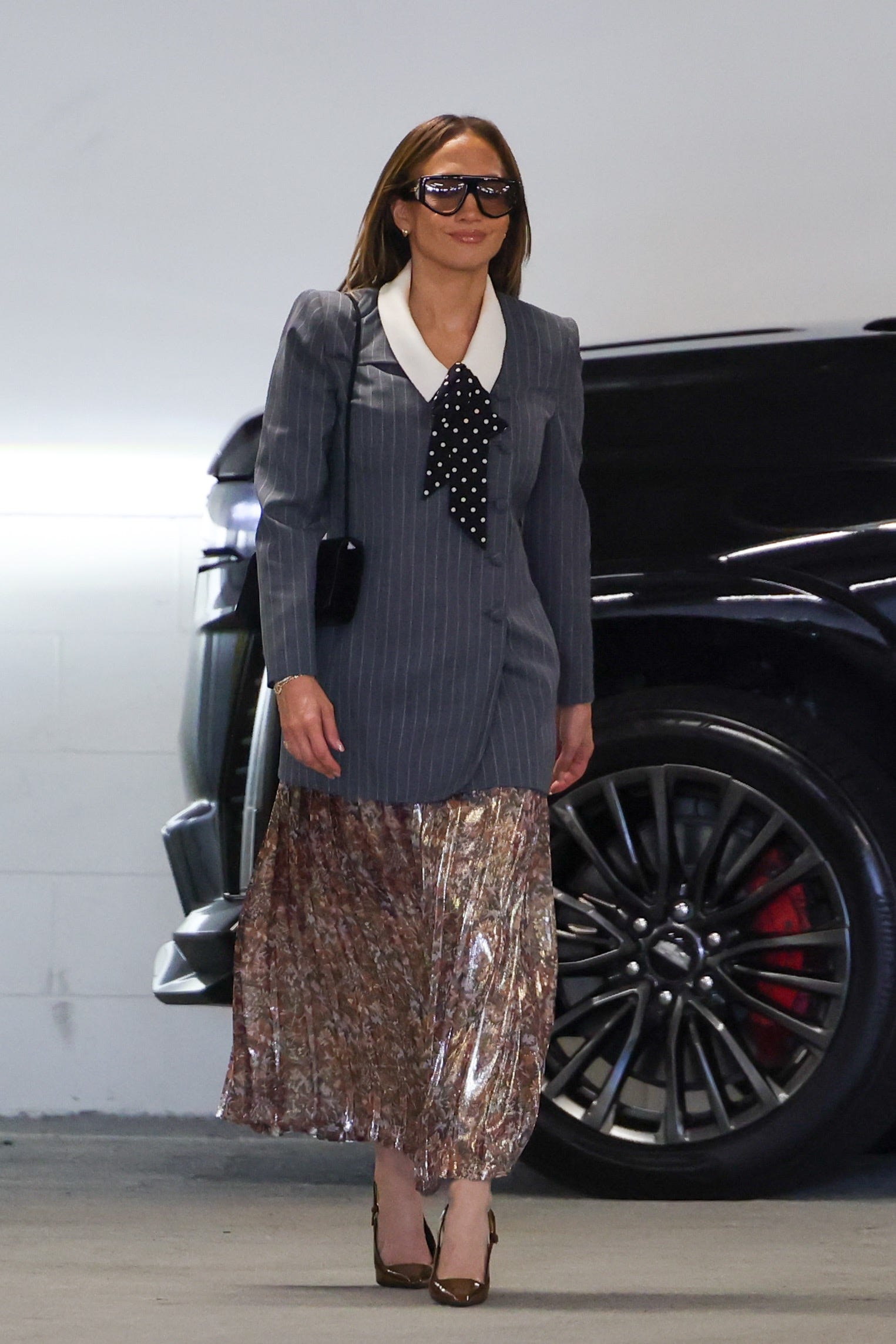 Jennifer Lopez Gives the Classic Skirt Suit a Bit of Razzle Dazzle
