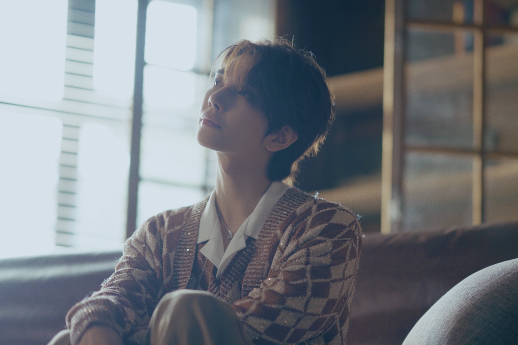 SEVENTEEN member Joshua in a teaser clip for his solo single Baby Come Home