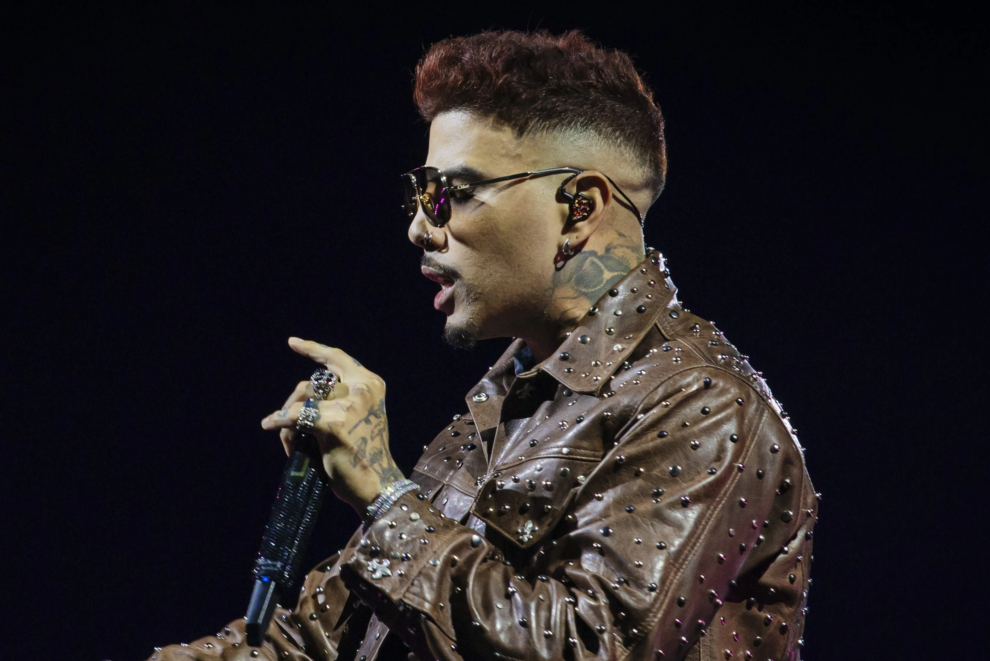 Rauw Alejandro performing live on stage during a concert