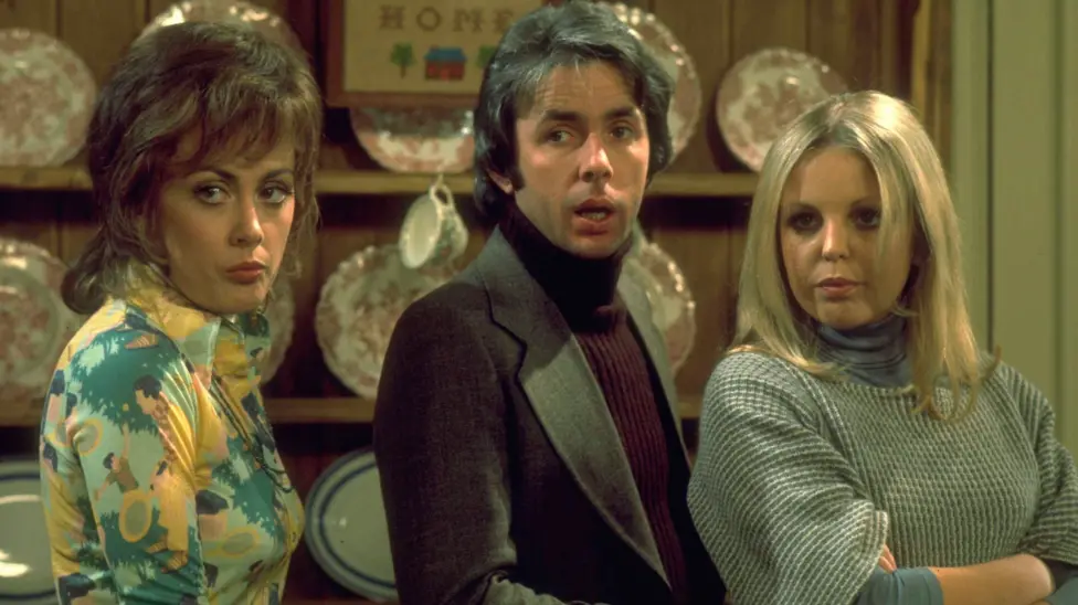 Paula Wilcox, Richard O'Sullivan and Sally Thomsett as Chrissy, Robin and Jo in Man About The House, all with 70s clothes and haircuts