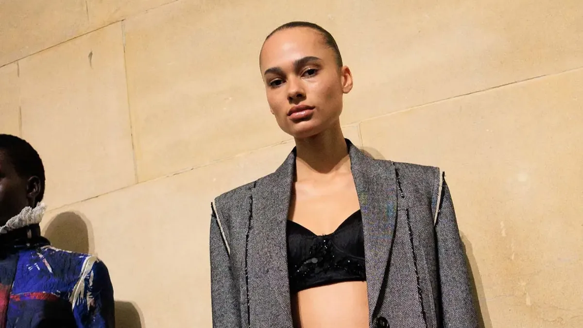 Model walking the runway at a London Fashion Week show