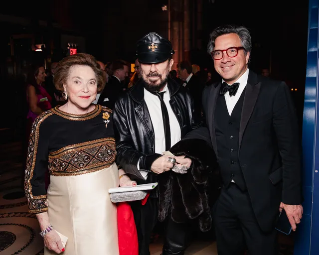 Image may contain Peter Marino J Balvin Clothing Coat Jacket Adult Person Photobombing People and Accessories