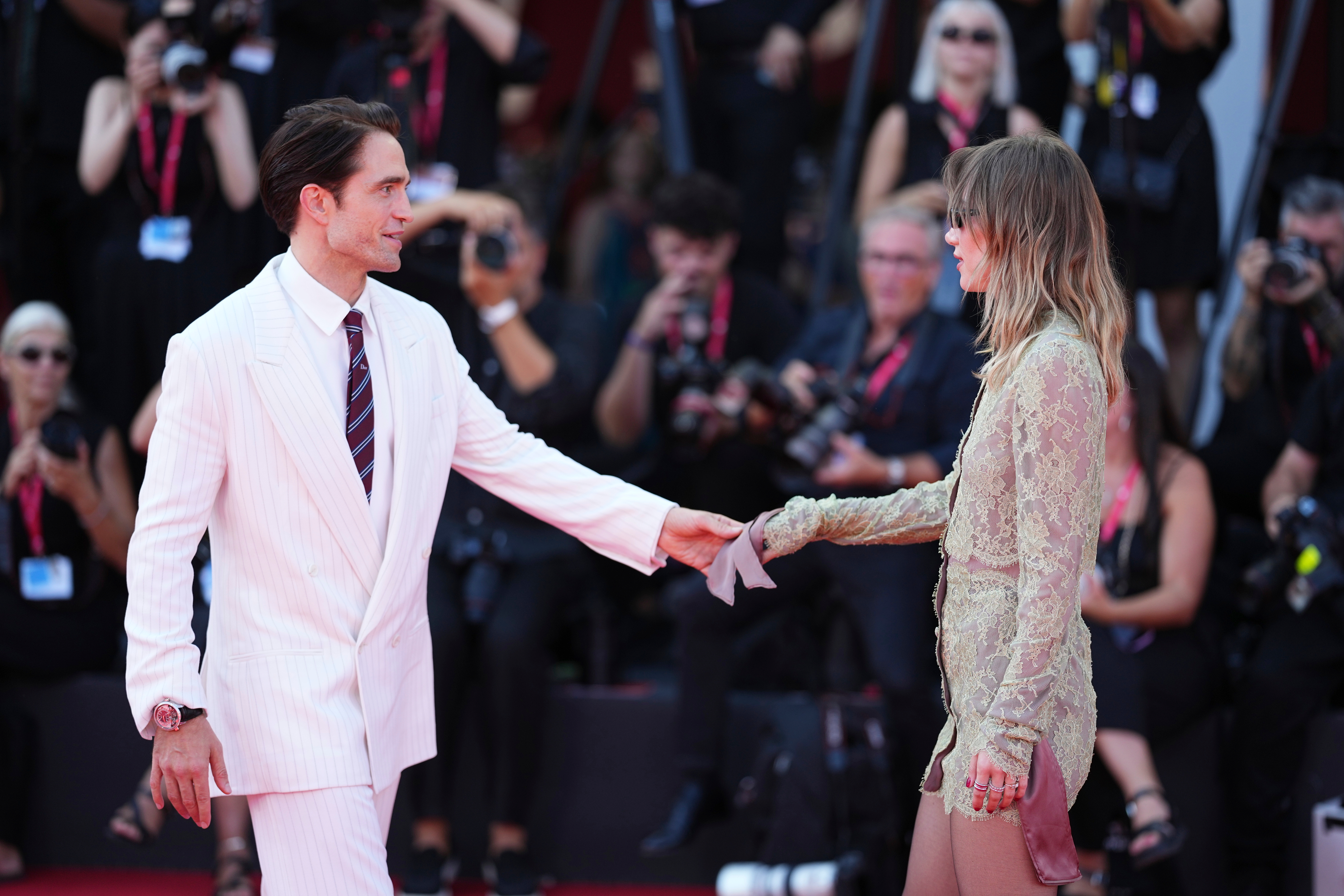 Robert Pattinson and Suki Waterhouse on the red carpet.