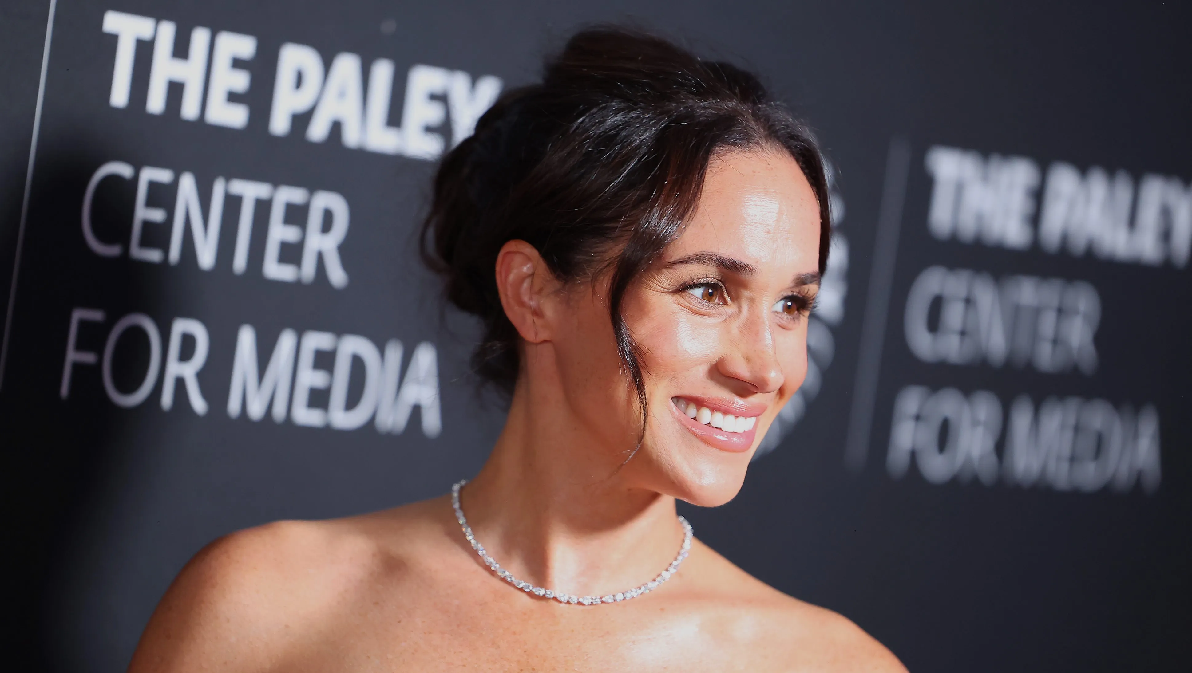 Meghan Markle attending a public event in a chic outfit