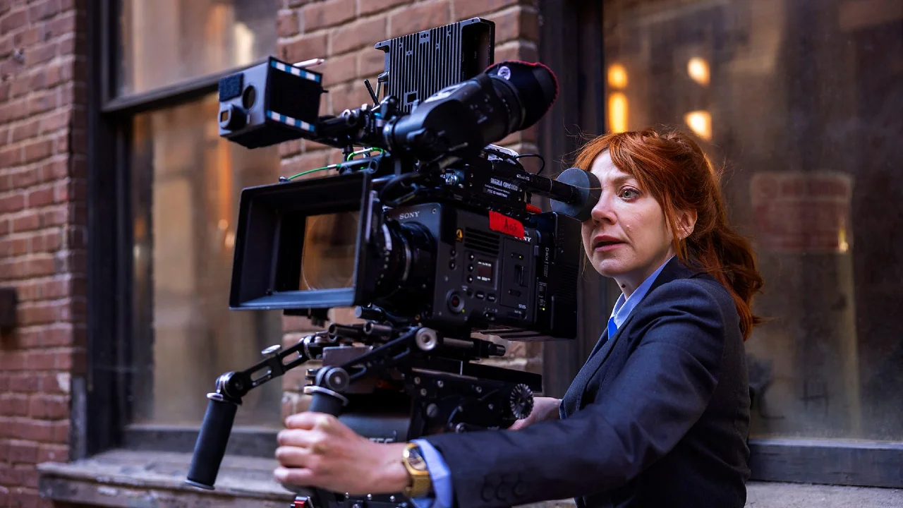 Diane Morgan posing in character as Philomena Cunk for a news announcement