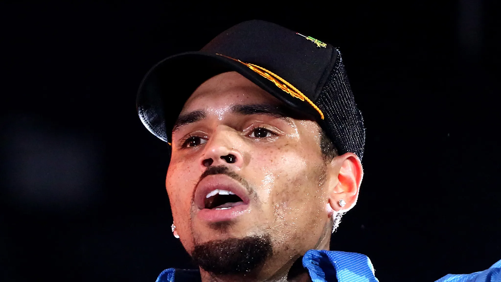Chris Brown performing on stage during a concert