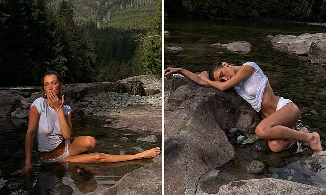 Bella Hadid posing in a wet t-shirt while lying in a river for a fashion photoshoot.