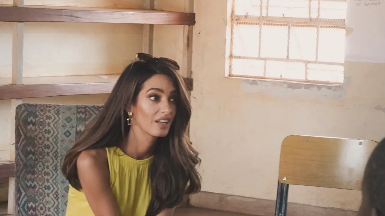 Amal Clooney Brings Her Suiting and Summer Dresses to Malawi