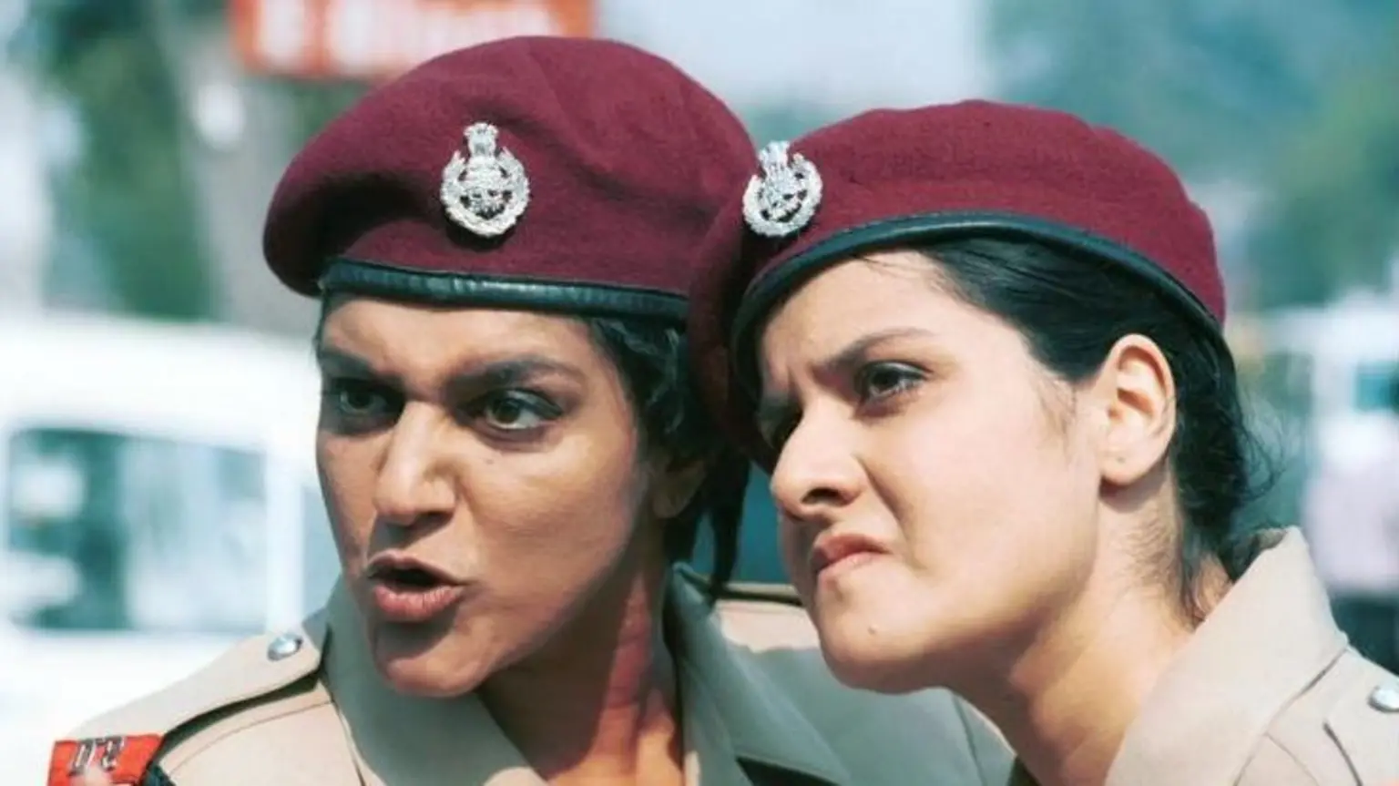 Goodness Gracious Me: Back Where They Came From - Picture shows Meera Syal and Nina Wadia as Delhi policewomen, Renu and Rita. Through a series of mishaps the Coopers leave England for a skiing holiday in Switzerland - o