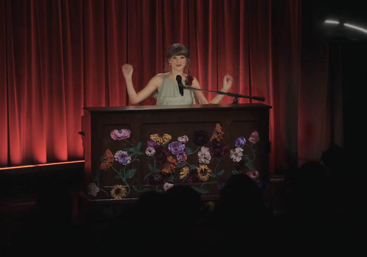 Taylor Swift performing acoustic music in a special video release
