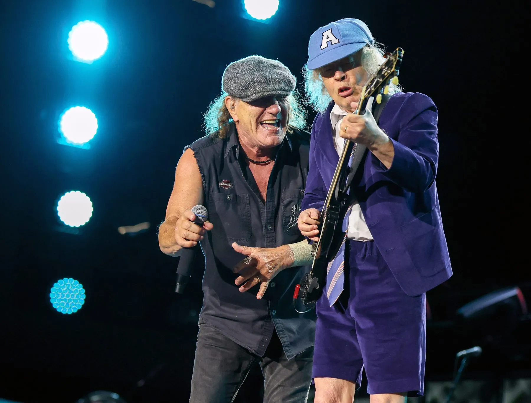 Brian Johnson (L) and Angus Young of AC/DC