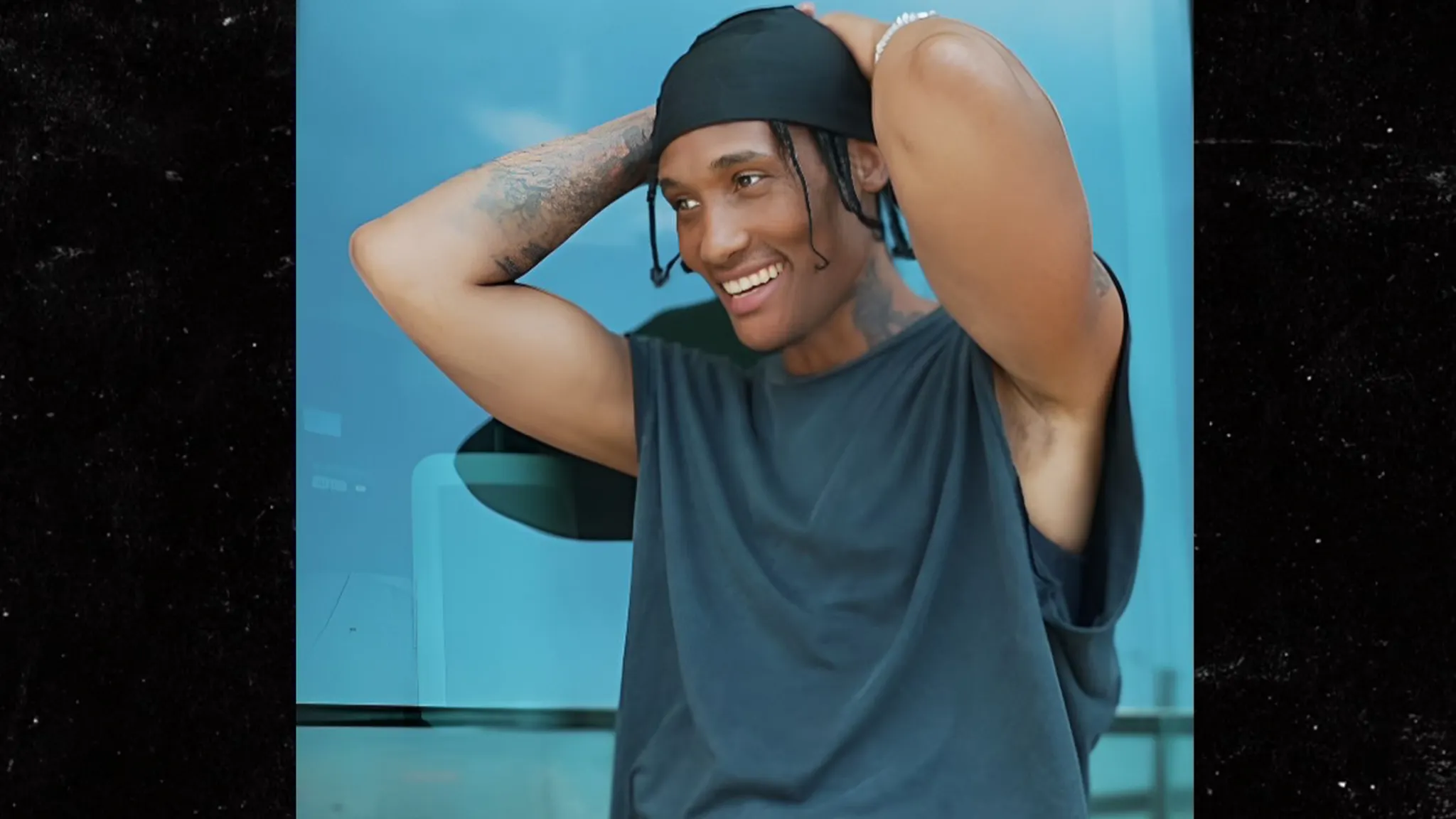 D. Smith posing at an event