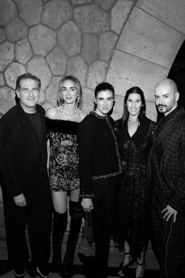 Image may contain Jess Mills Andrea Echeverri People Person Clothing Coat Adult Formal Wear Suit Dress and Face