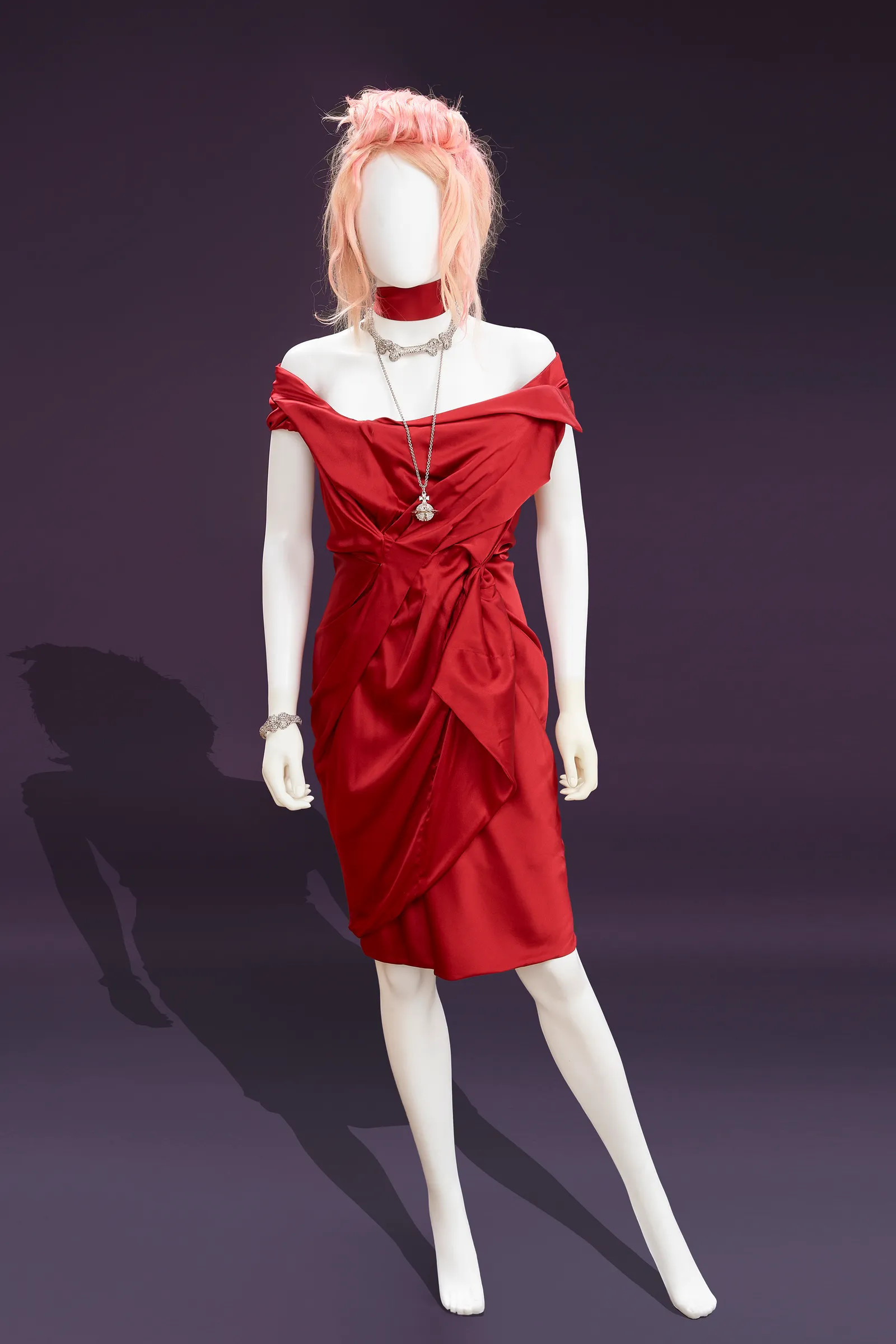 Image may contain Adult Person Clothing Dress Accessories Jewelry Necklace Face and Head