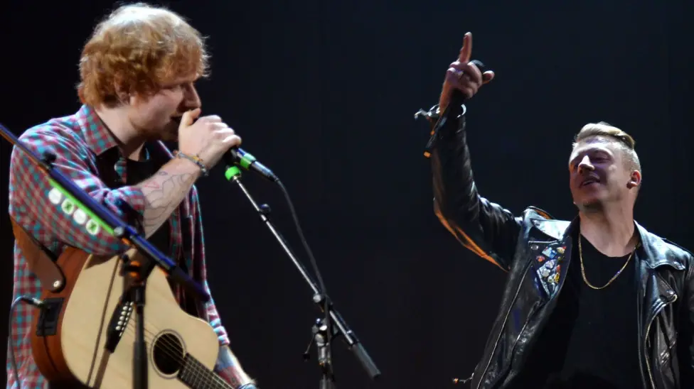 Ed Sheeran performing with Macklemore at the iHeartRadio Music Festival in 2014