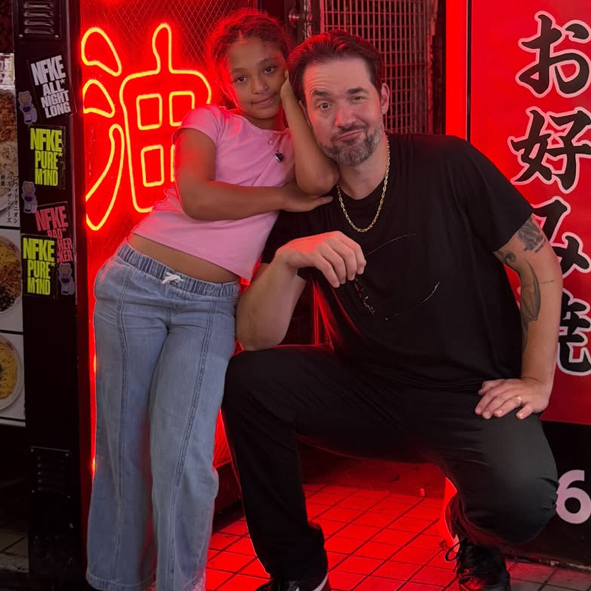 Alexis Ohanian and his daughter Olympia attending a basketball game together