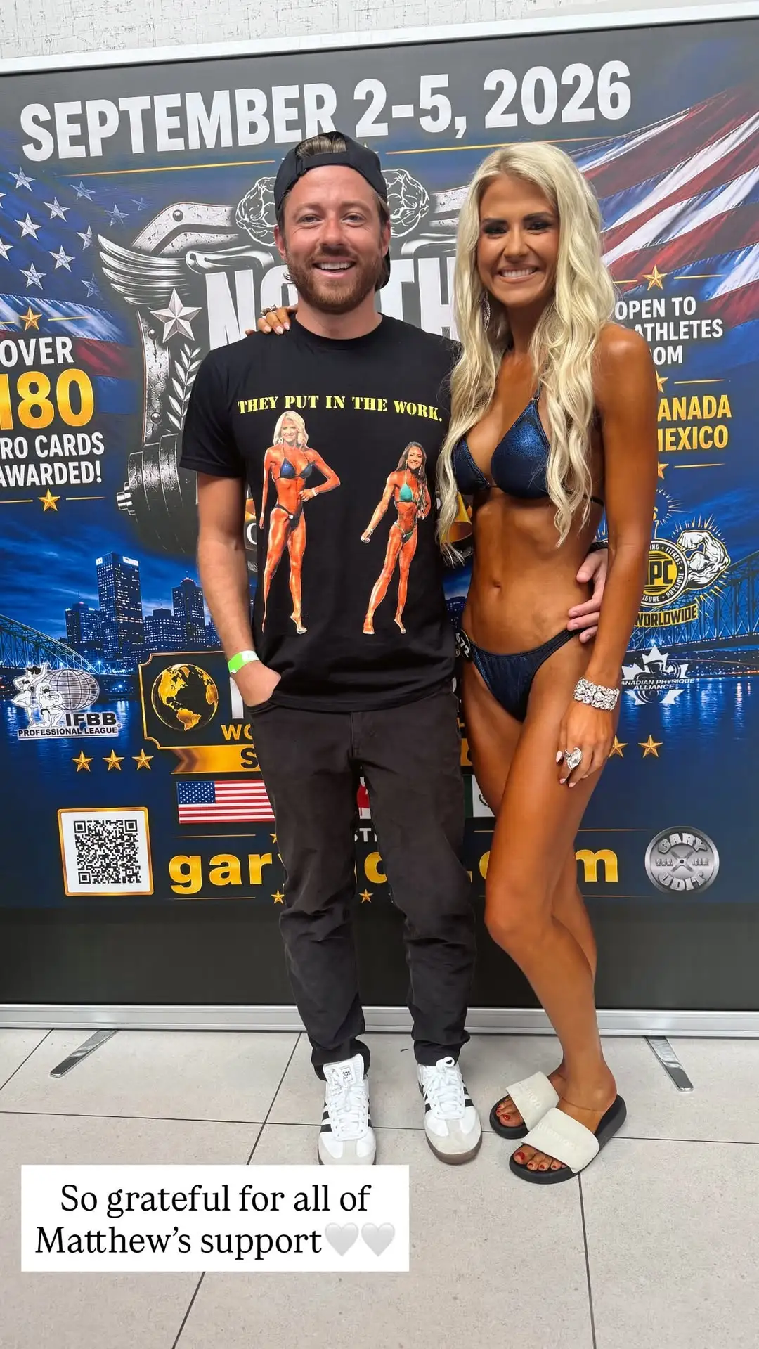 Elizabeth Smart on stage at a fitness and bodybuilding competition wearing a blue micro bikini