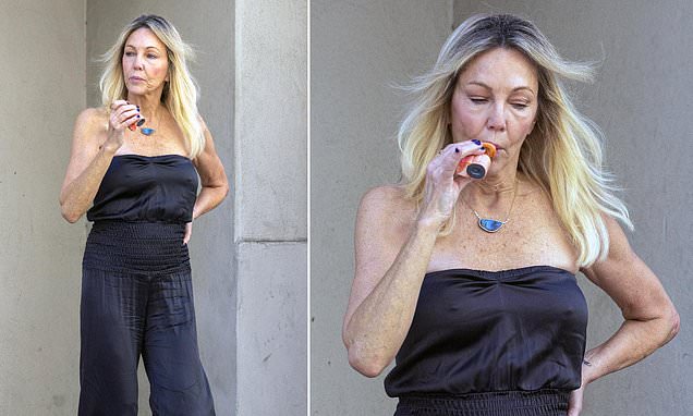 Heather Locklear wearing a strapless jumpsuit outside a podcast studio