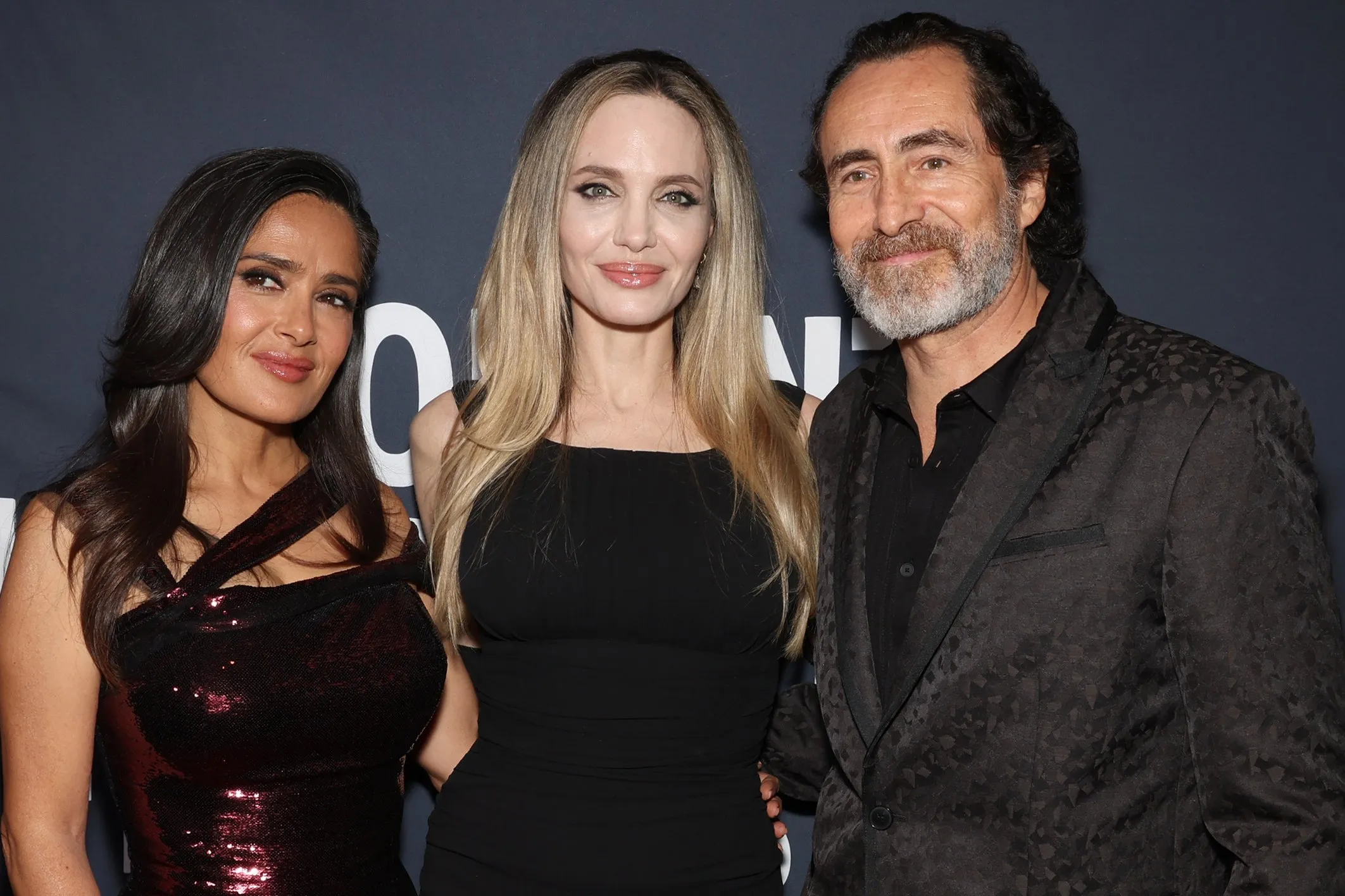 Angelina Jolie and Salma Hayek Pinault posing together at a film event.