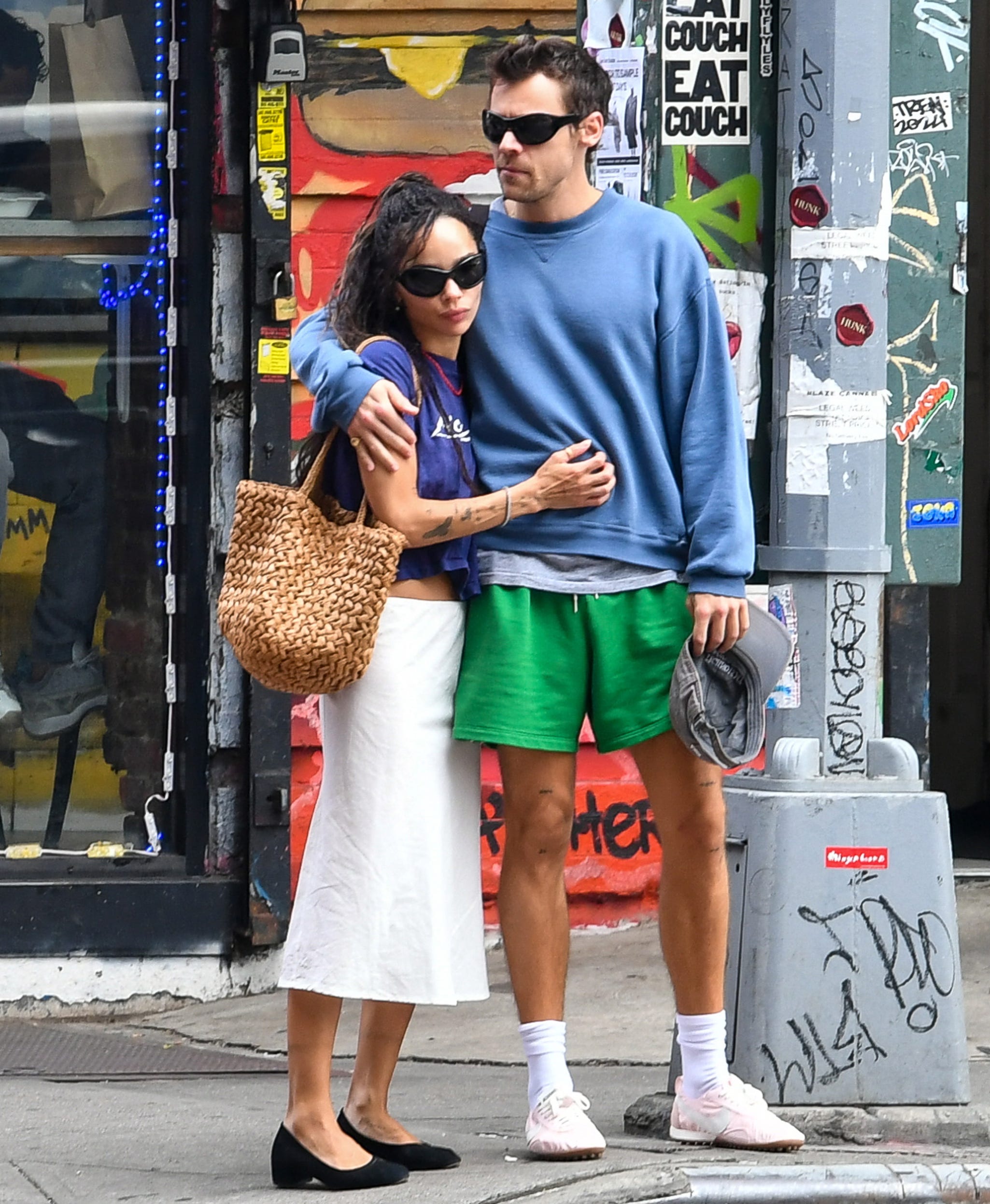 Zoë Kravitz walking outdoors in a pair of updated ballet flats.